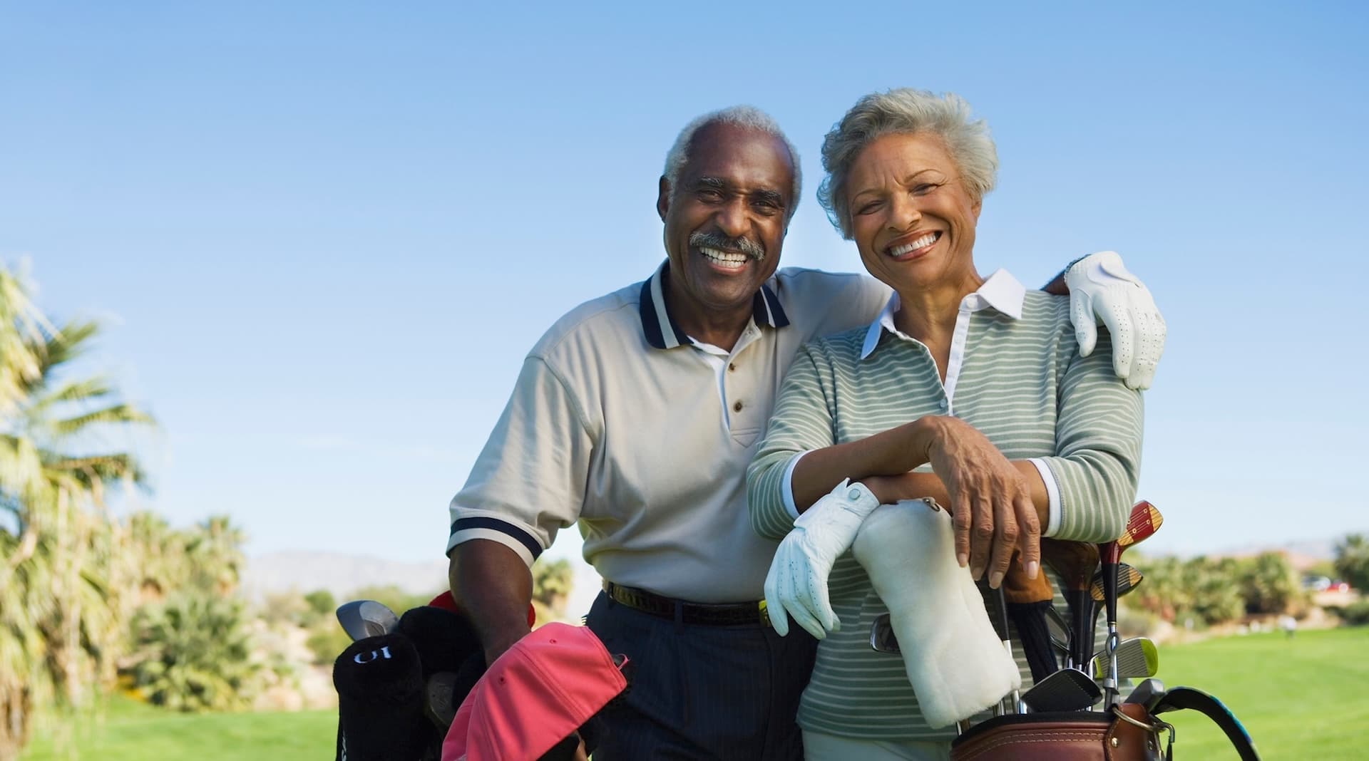 Couple smiling at golf course