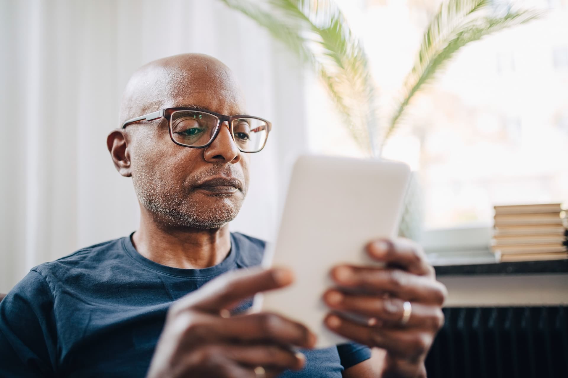 Concerned man with ipad